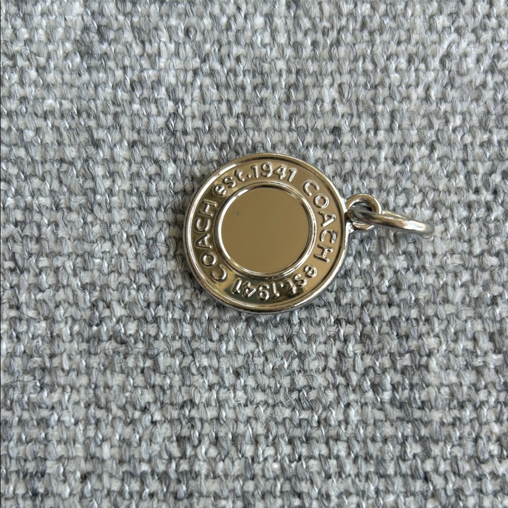 Coach Silver coin